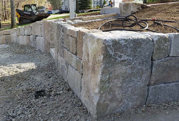 Stone retaining wall.